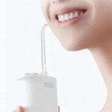 عکس دستگاه شست و شوی دهان و دندان شیائومی MEO704 - فروشگاه ماه به ماه